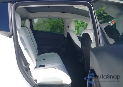 2023 Tesla Model Y Awd/Long Range Dual Motor All-Wheel Drive from USA, damaged, VIN 7SAYGAEE2PF642162